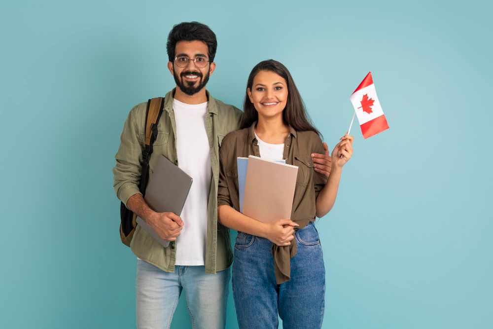Cheerful multicultural man and woman with canadian flag